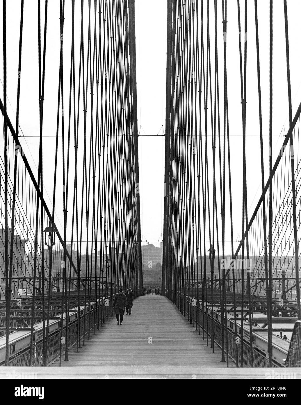 New York, New York c. 1930 The first of the great suspension bridges