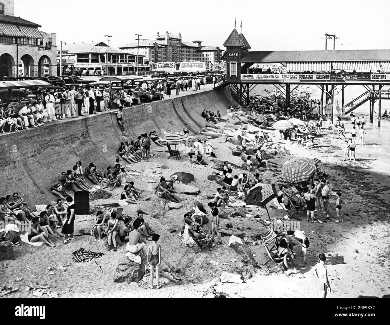 Galveston, Texas:  c. 1934 The beach scene at the pier in Galveston Stock Photo