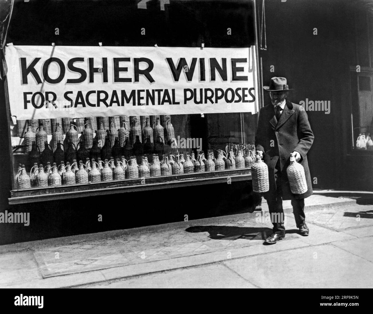 New York, New York c. 1930 A Jewish man buying kosher wine for