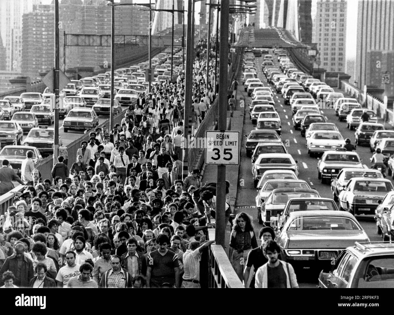 New York, New York c. 1978. New Yorkers jam the Brooklyn Bridge on