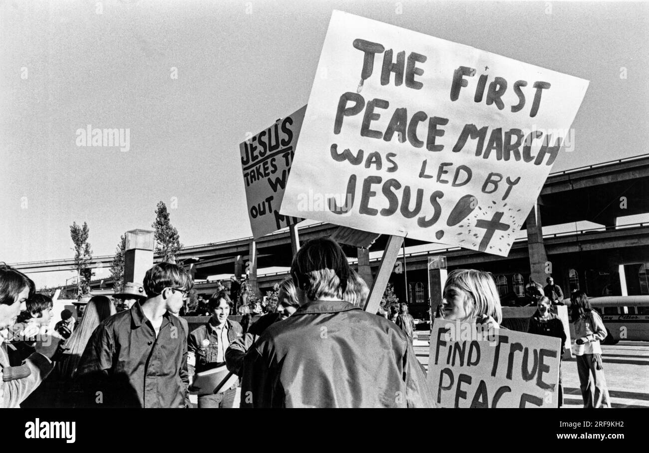 San Francisco, California:  c. 1968 People at a demonstration in Justin Herman Plaza protesting the war in Vietnam. Stock Photo
