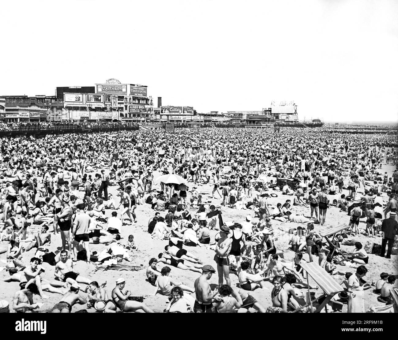 New York, New York: c. 1938 The crowds at Coney Island Beach in New