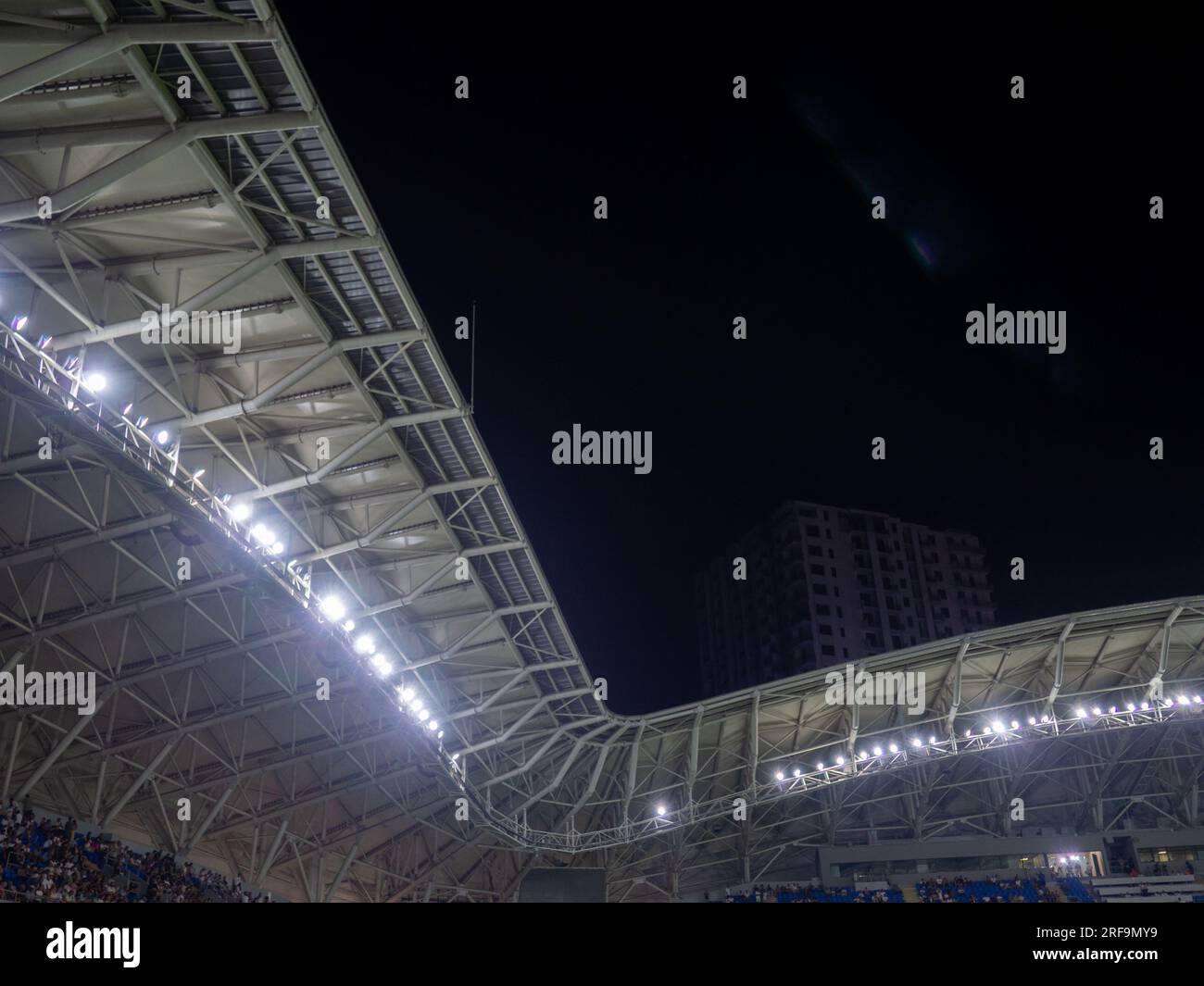 Arch of the football stadium. Football match lighting. Part of a sports