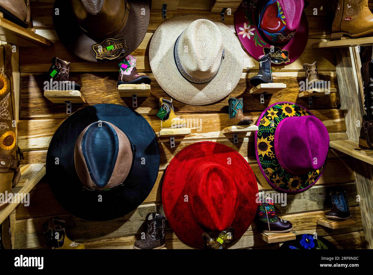 Cowboy boots and leather belts in a business showcase in the center of