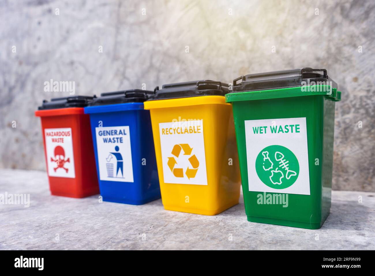The concept of waste classification for recycling. Collection of bins for different types of