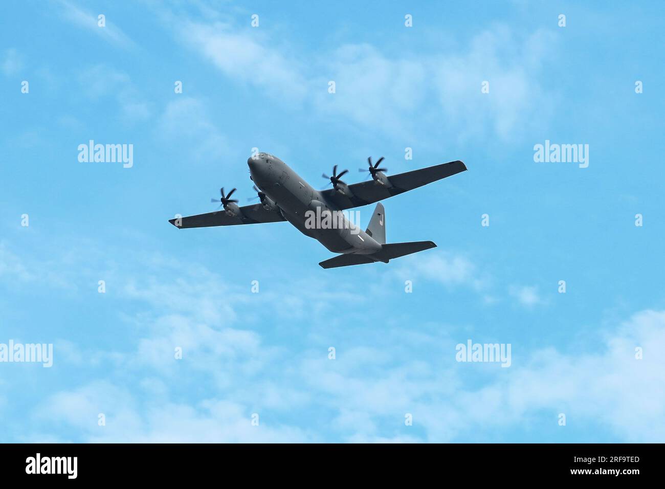 A C130-J Super Hercules executes a flyover during a runway ribbon ...