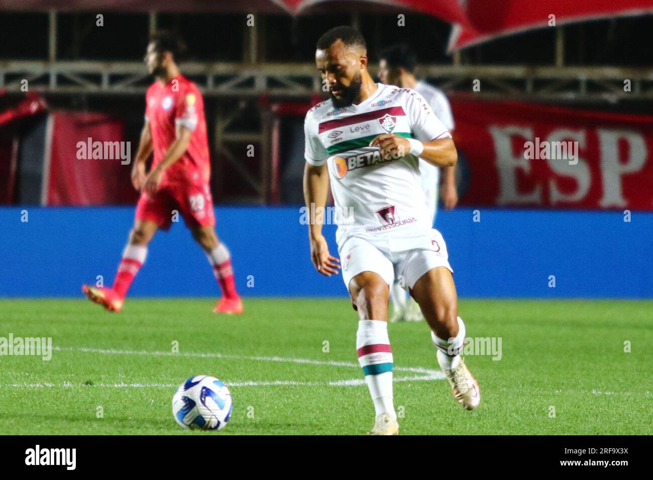 Samuel Xavier of Brazil's Fluminense, center, and Rene of Brazil's  Internacional head the ball during a Copa Libertadores semifinal second leg  soccer match at Beira Rio stadium in Porto Alegre, Brazil, Wednesday