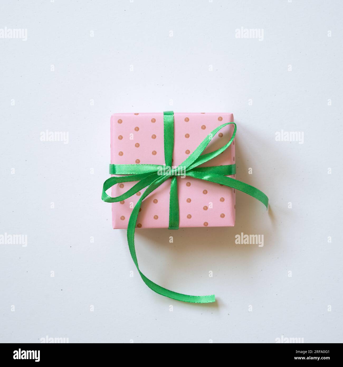 Pink dot pattern gift box isolated on white background. top view, copy space Stock Photo