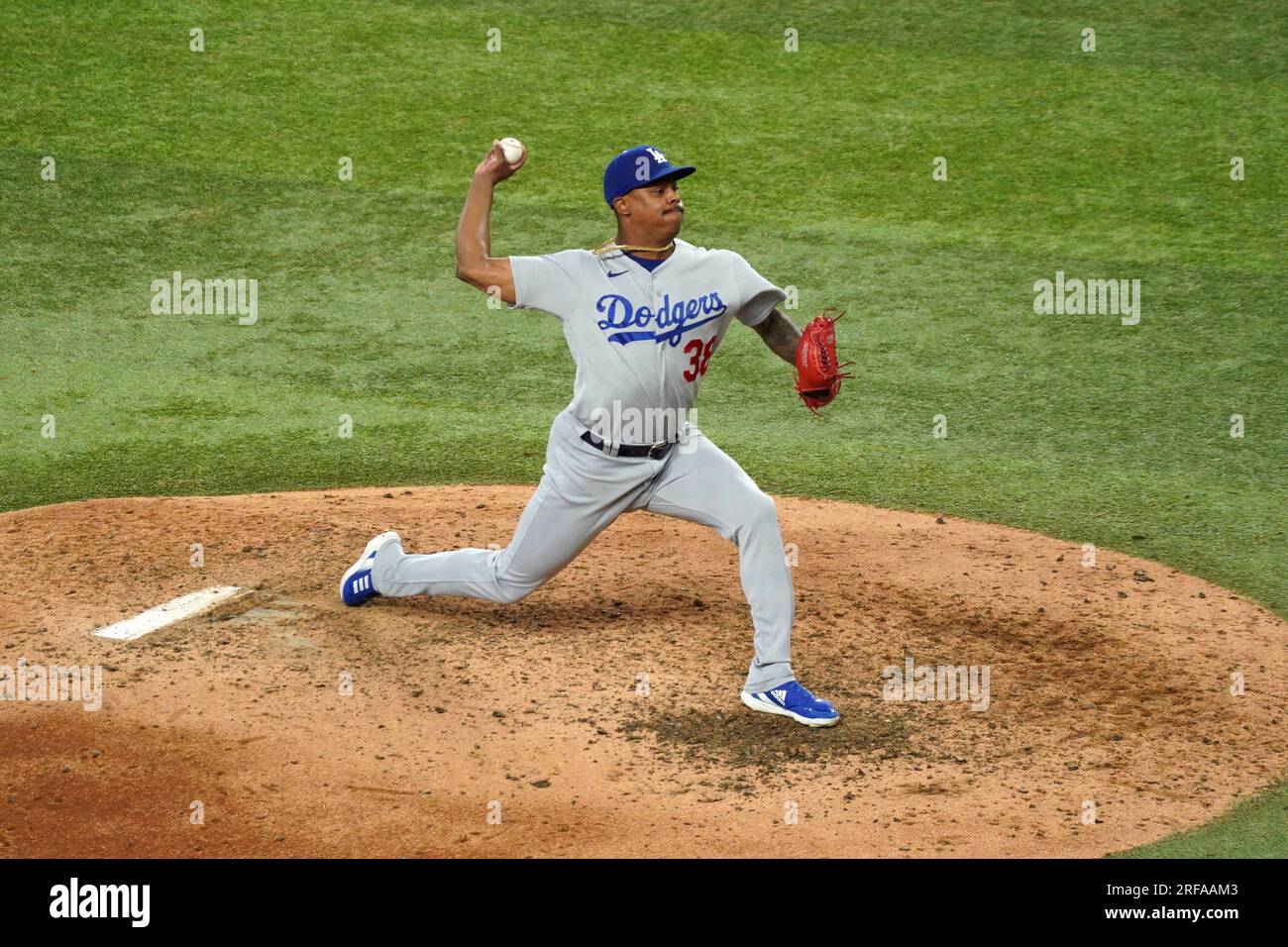 Los Angeles Dodgers relief pitcher Yency Almonte (38) works against the