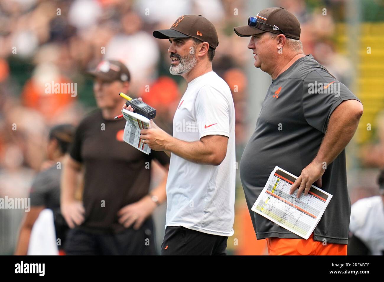 Cleveland Browns head coach Kevin Stefanski, left, and offensive  coordinator Alex Van Pelt, right, talk during an NFL football camp,  Tuesday, Aug. 1, 2023, in Berea, Ohio. (AP Photo/Sue Ogrocki Stock Photo -