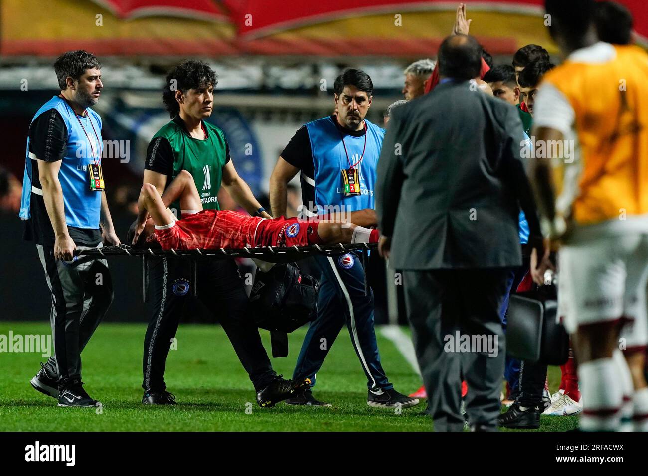 Coach Paulo Autori of Brazil's Athletico Paranaense scratches his head  during a Copa Libertadores round of sixteen second leg soccer match against  Argentina's River Plate at the Libertadores de America stadium in