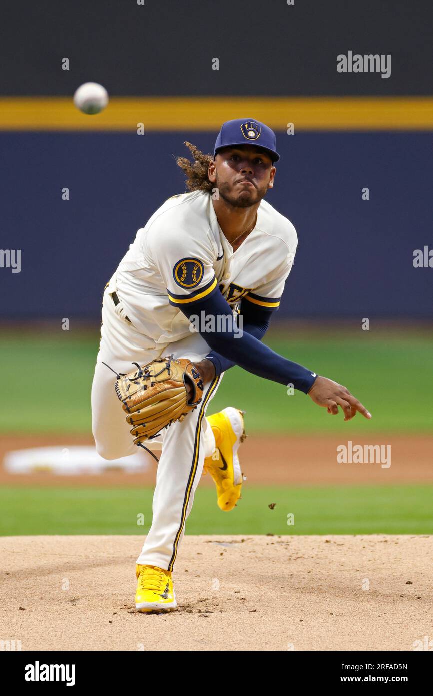 MILWAUKEE, WI - JULY 26: Milwaukee Brewers starting pitcher Freddy Peralta  (51) delivers a pitch during an MLB game against the Cincinnati Reds on  July 26, 2023 at American Family Field in