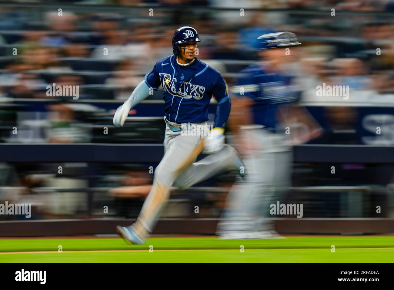 St. Petersburg, FL. USA; Tampa Bay Rays shortstop Wander Franco (5) showing  off his brightly colored retro Devil Rays socks and how they match his Un  Stock Photo - Alamy