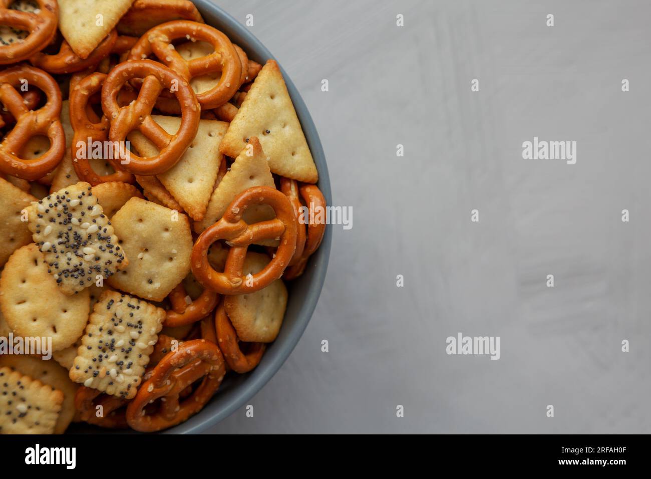 Homemade Party Snack Mix with Crackers and Pretzels in a Bowl, top view