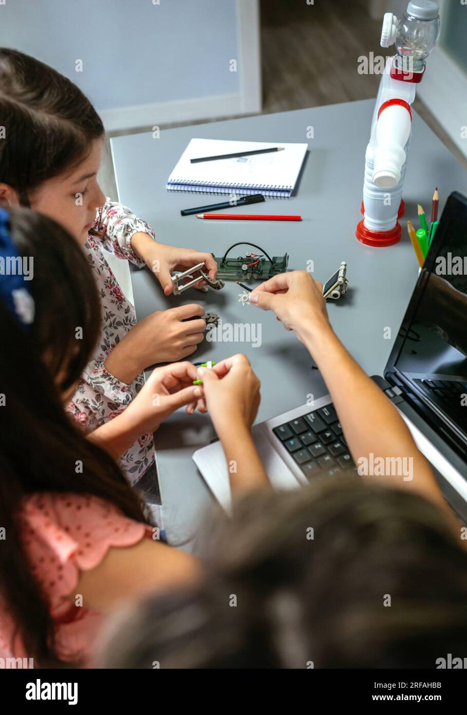 Helping hand children hi-res stock photography and images - Alamy