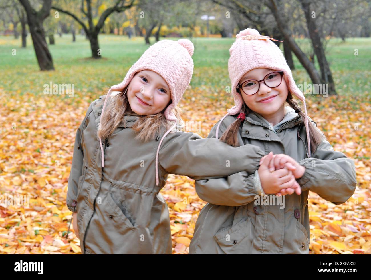 Two girls walking in forest hi-res stock photography and images - Alamy