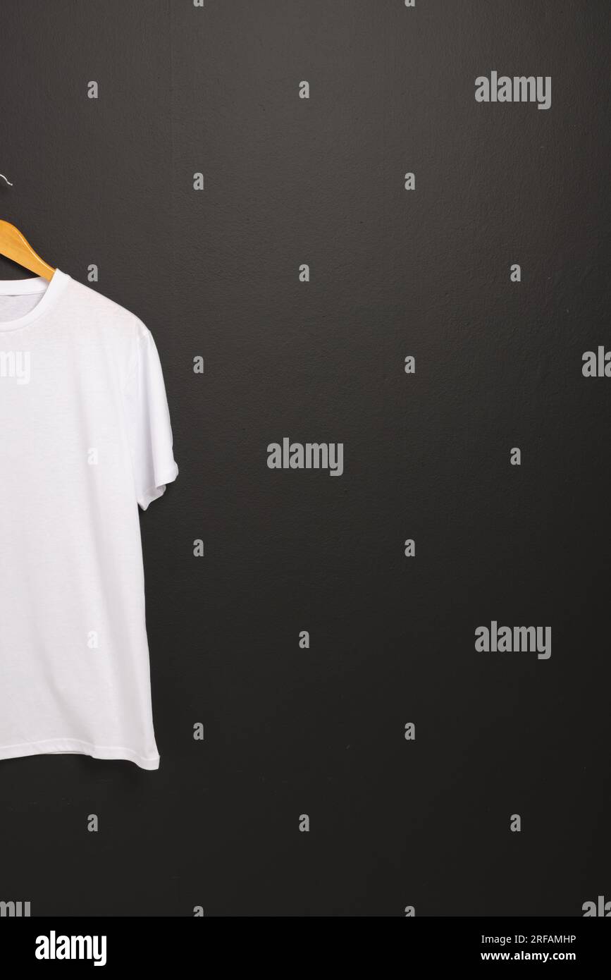 Black t shirt on hanger hi res stock photography and images Alamy