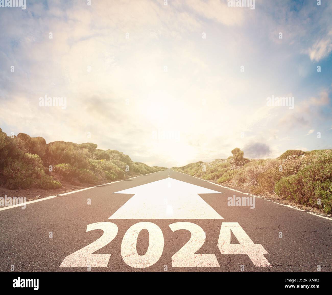 2024 target indicated by arrow on empty road. Coming into the new year