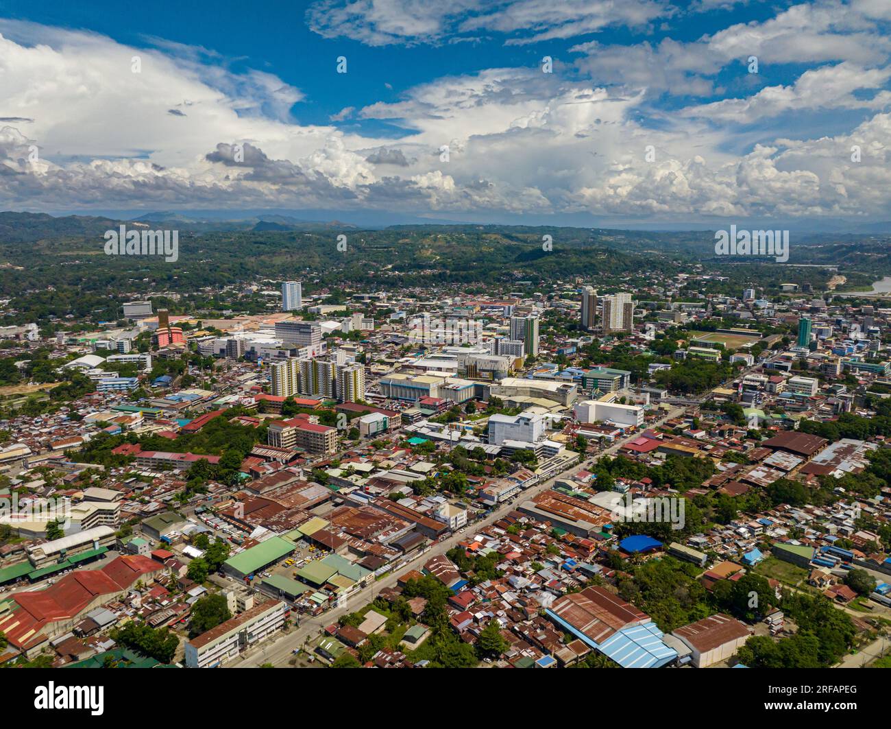 Beatiful city and blue sky and clouds in Cagayan de Oro. Northern Mindanao, Philippines. Cityscape. Stock Photo