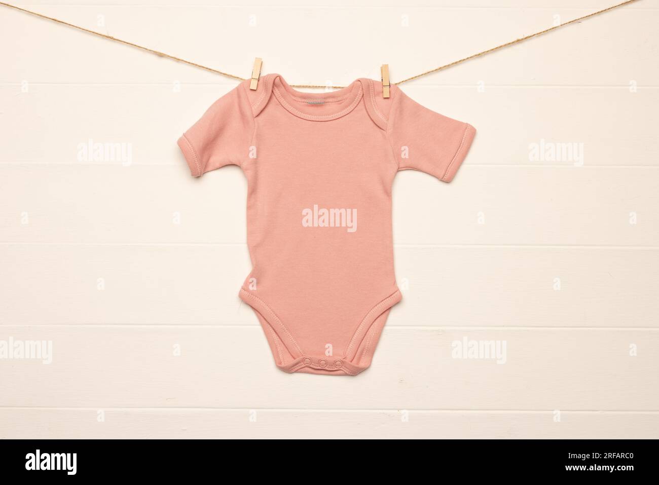 Plain pink store babygrow