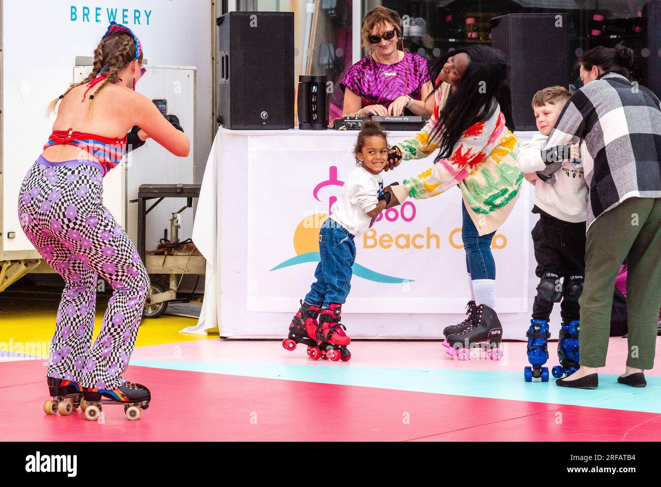 August 1st 2023 A child with her mother poses for a photo at the Roller