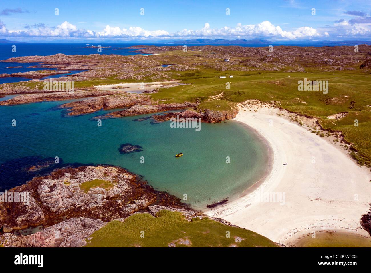 Drone view of the beautiful sandy beaches and rocky coastline of the north west coast of the Isle of Coll Stock Photo