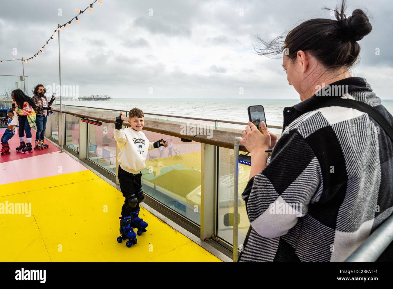 August 1st 2023 A boy poses for his mother to take a photo at the