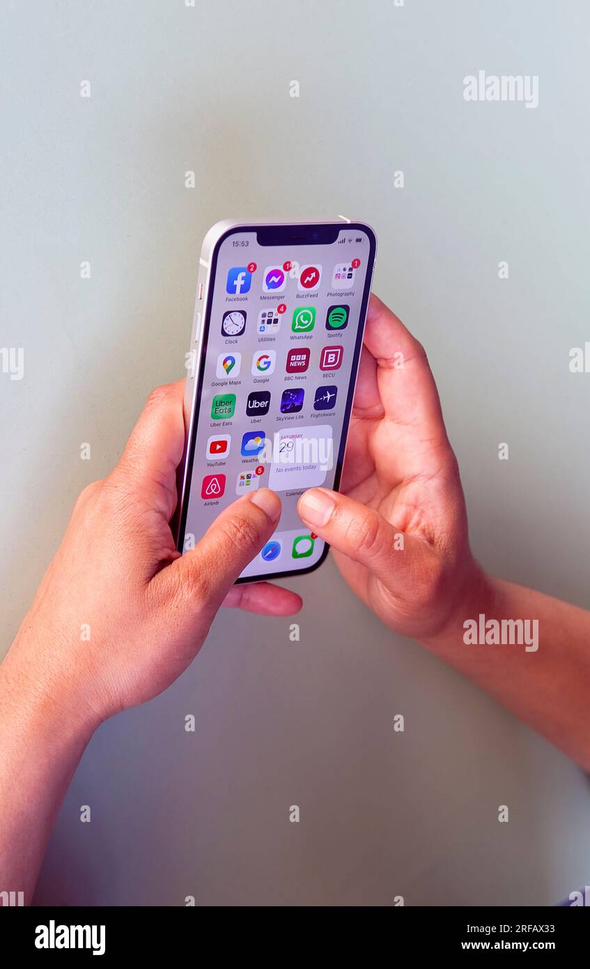 Using Apple Phone Mobile cell cellular telephone phone fone hi-res stock photography and ...