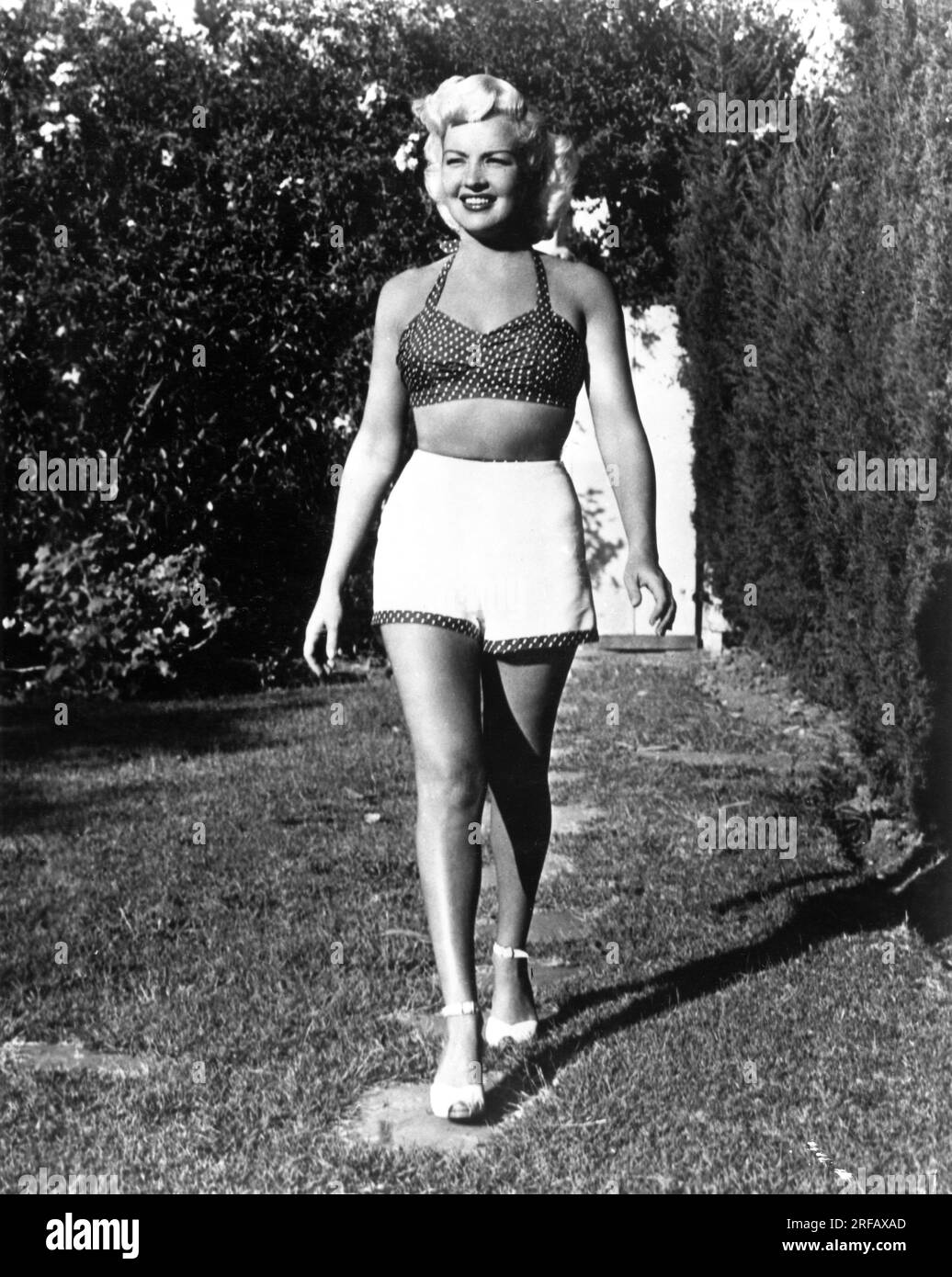 BETTY GRABLE circa 1945 candid full length portrait at home publicity