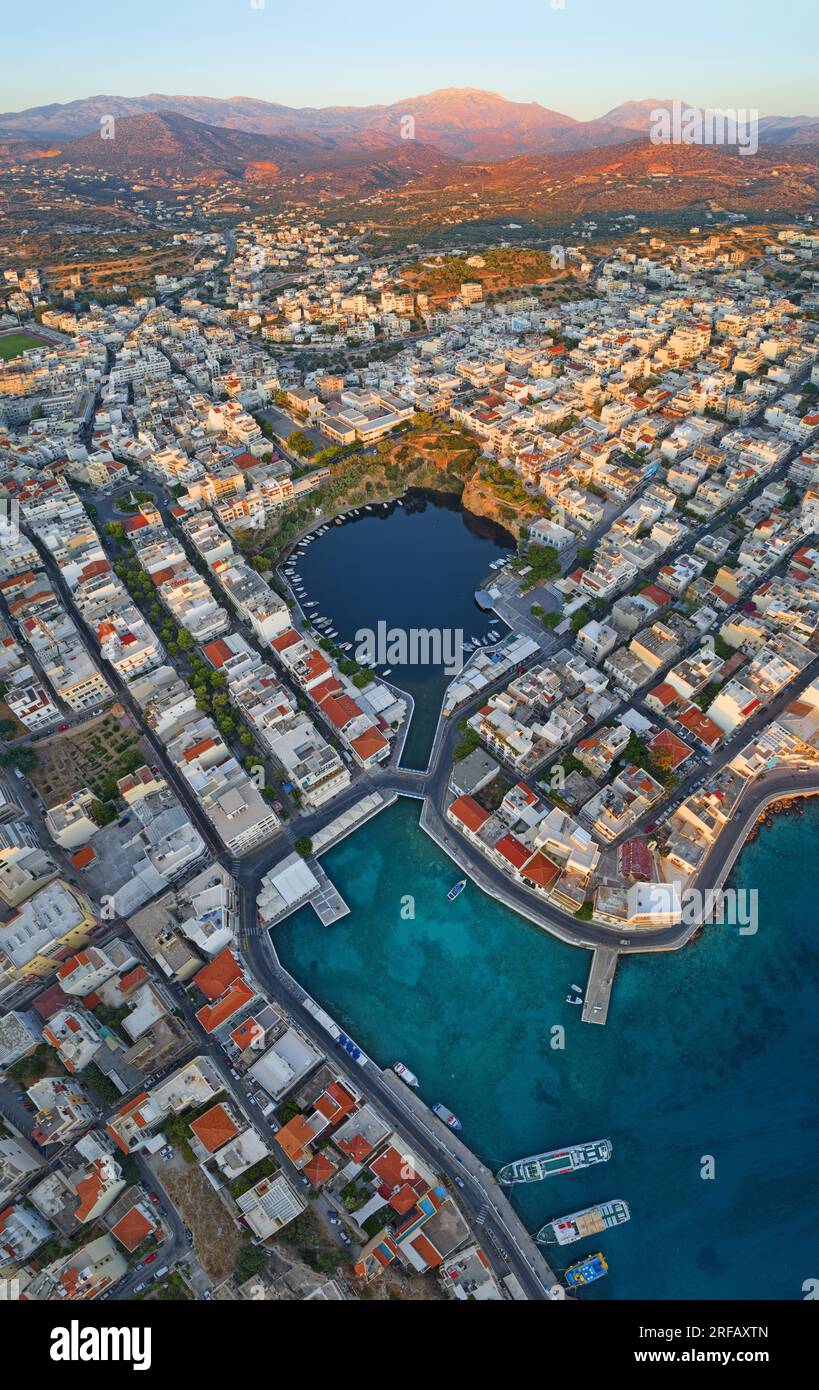 Greece, Crete, Lasithi, Agios Nikolaos - panoramic view of Lake Voulismeni and summer beautiful greek city Stock Photo