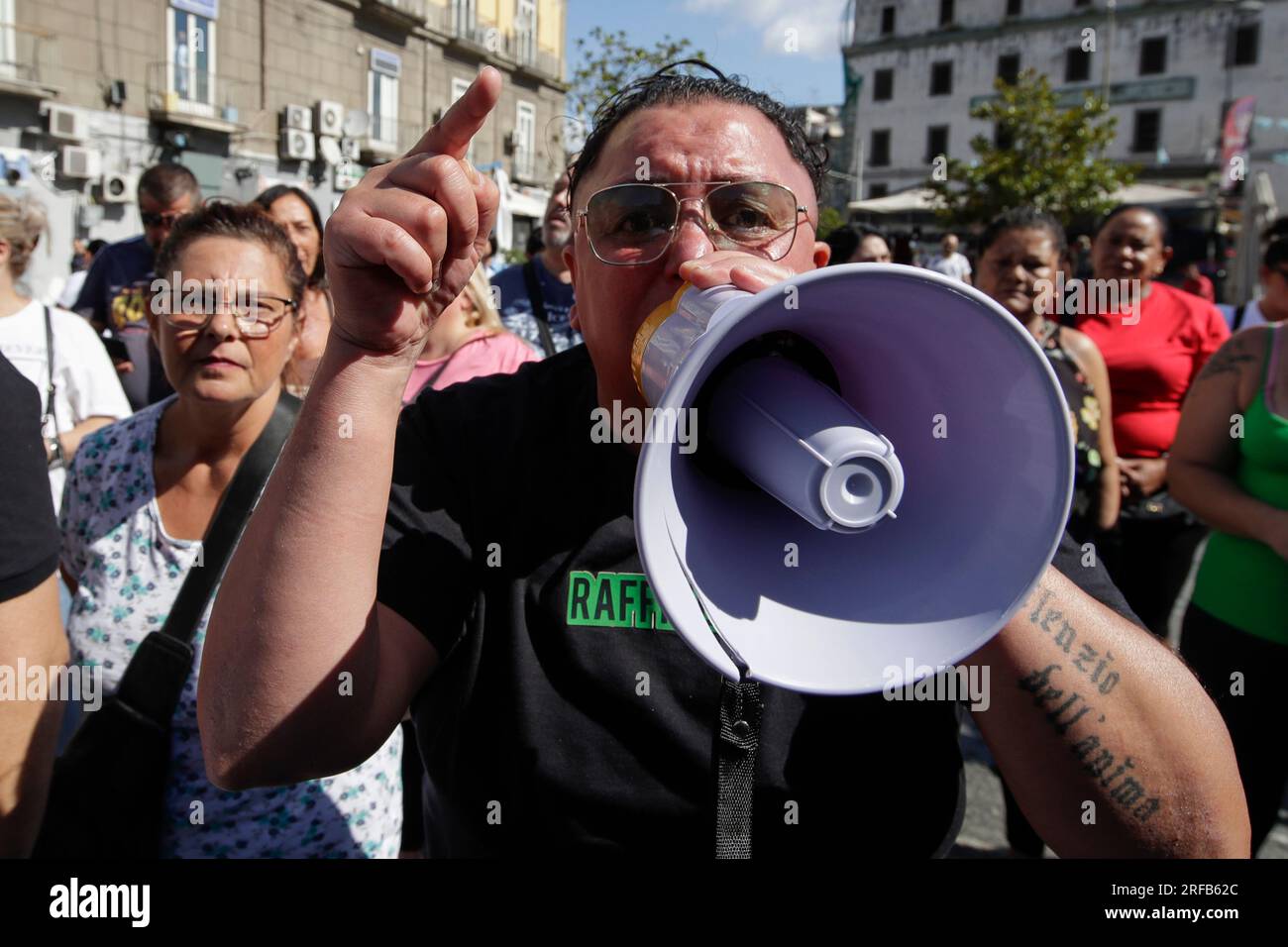 Naples, Italy. 02nd Aug, 2023. The demonstration that took place in Naples for the suspension of the basic income by the government, stopping first at the headquarters of the Fratelli di Italia party and then at the INPS headquarters Credit: Independent Photo Agency/Alamy Live News Stock Photo