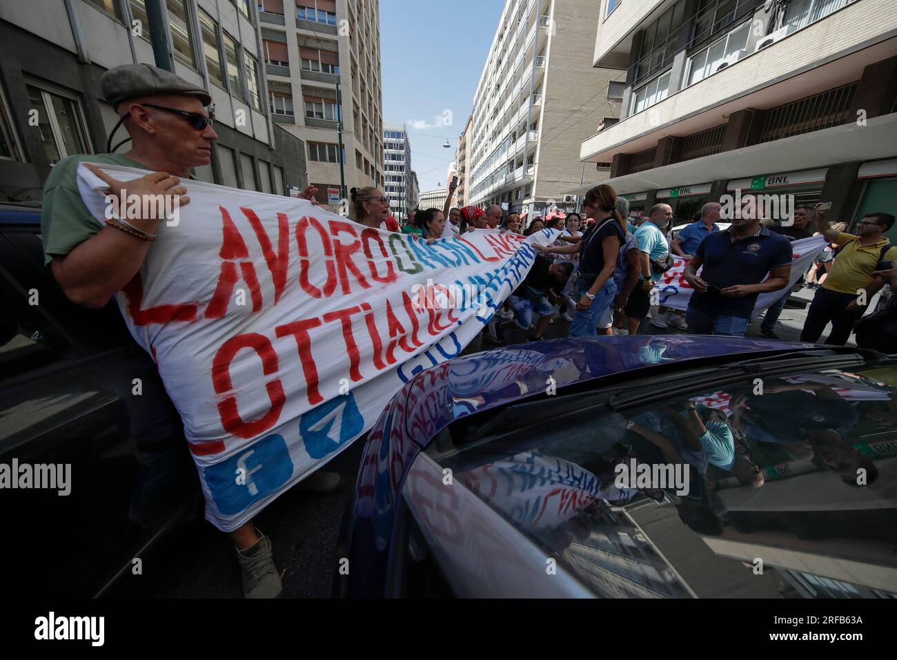 Naples, Italy. 02nd Aug, 2023. The demonstration that took place in Naples for the suspension of the basic income by the government, stopping first at the headquarters of the Fratelli di Italia party and then at the INPS headquarters Credit: Independent Photo Agency/Alamy Live News Stock Photo