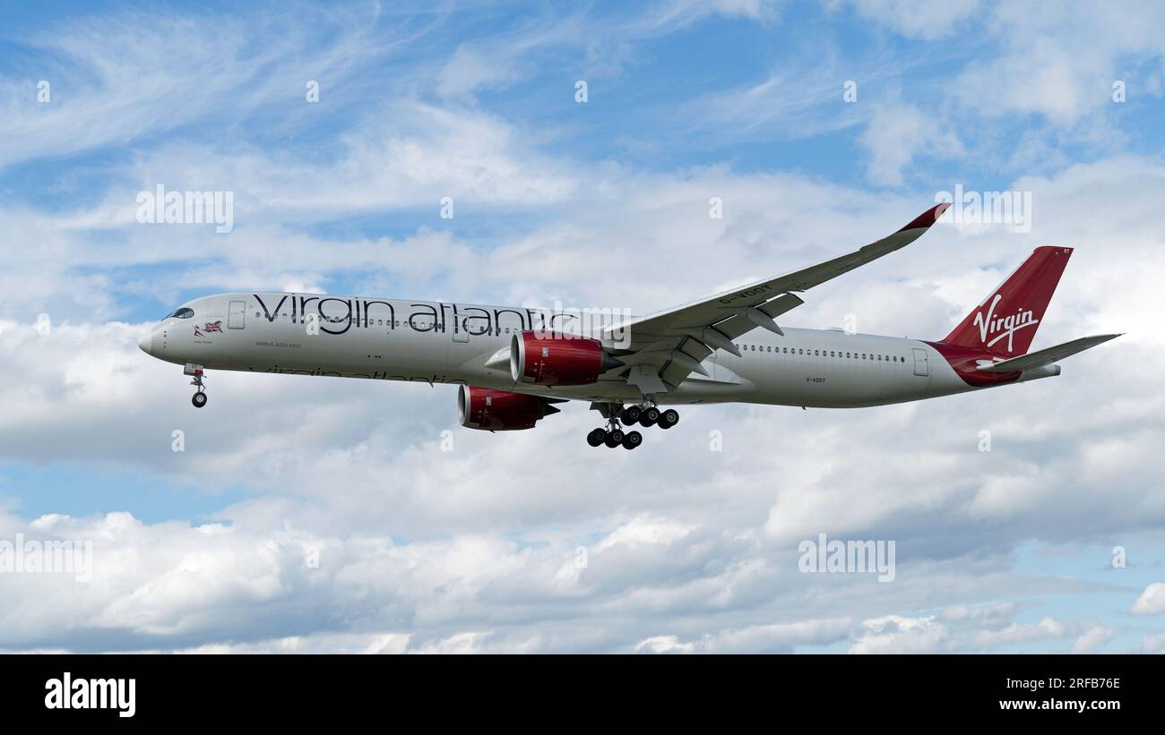Virgin Atlantic Airbus A350-1000 Ruby Slipper plane landing at London's Heathrow Airport. London - 1st August 2023 Stock Photo