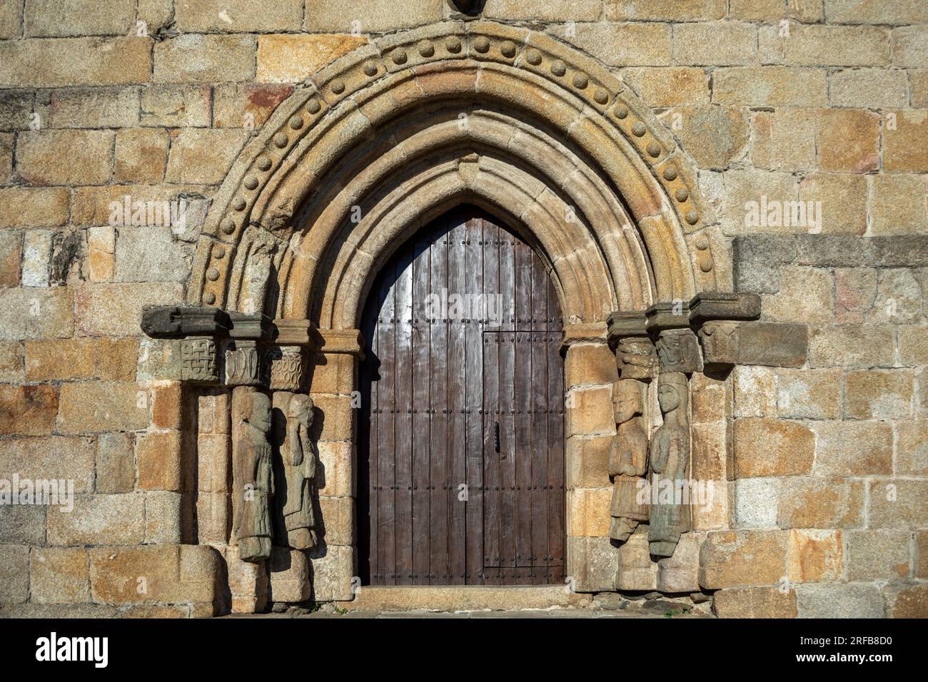 Romanesque door of the church of Santa Maria del Azogue in Puebla de Sanabria, Zamora, Spain Stock Photo