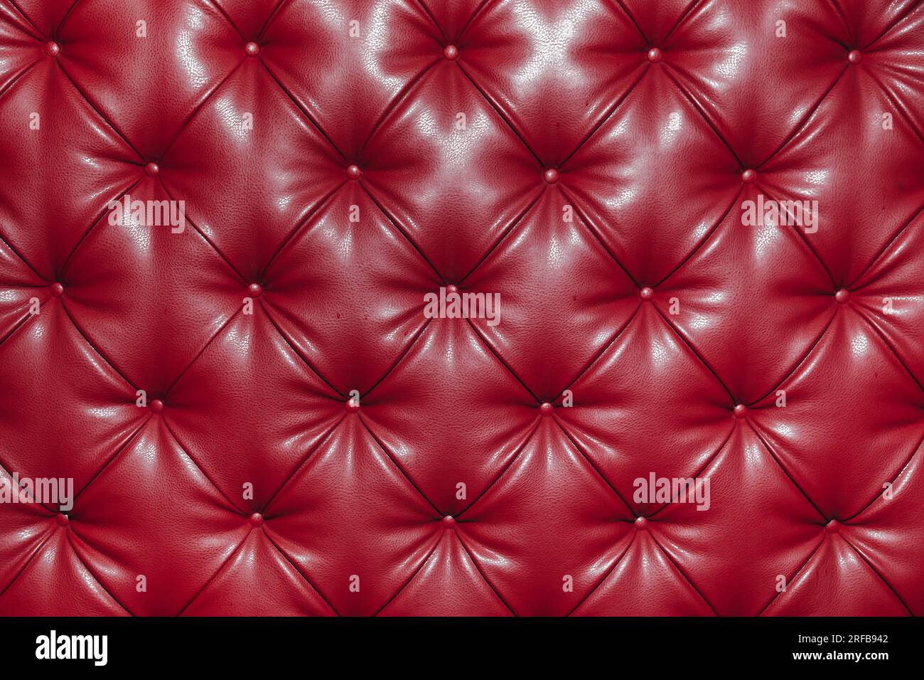 background pattern of red buttons of various size Stock Photo