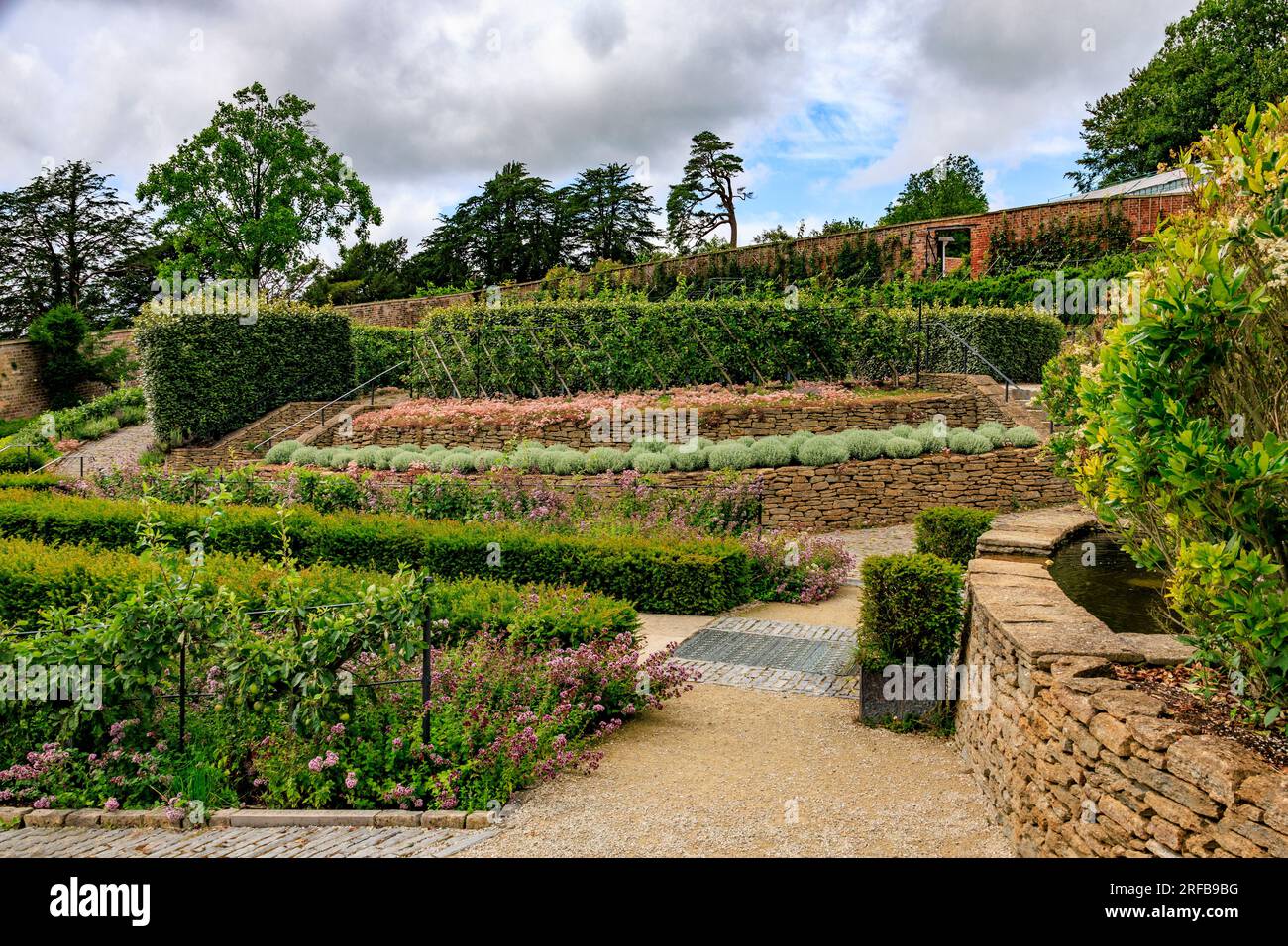 Some of the many different varieties of English apple trees growing in the Parabola walled garden at 'The Newt in Somerset', nr Bruton, England, UK Stock Photo