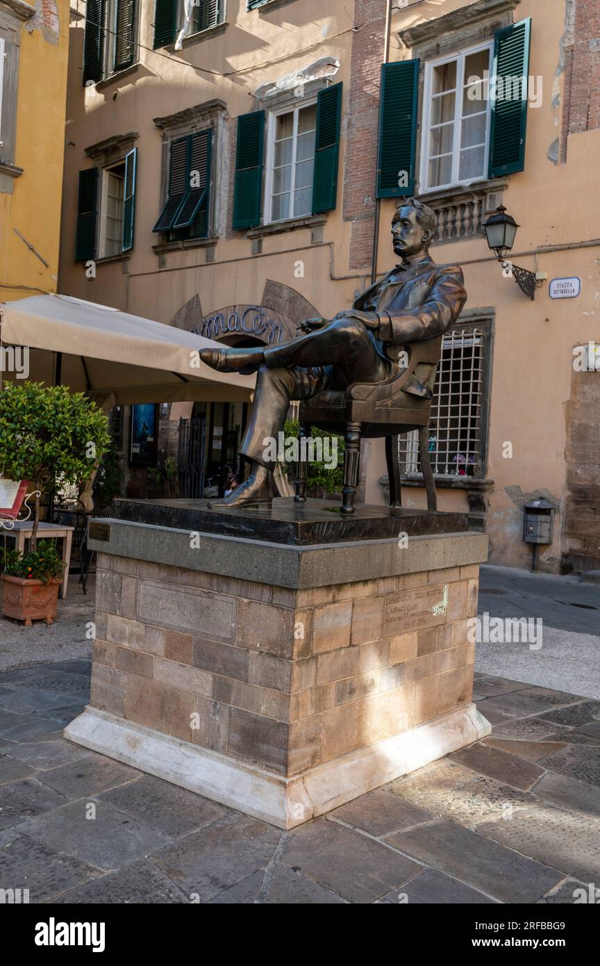 A statue of Lucca’s famous son, music composer Giacomo Puccini on Piazza Cittadella and birthplace in the city of Lucca in the Tuscany region of Italy Stock Photo