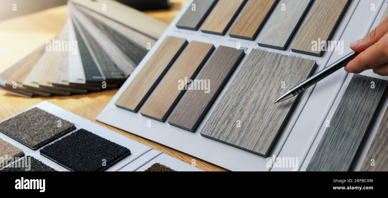 designer showing furniture and flooring material samples for interior design. banner with copy space Stock Photo