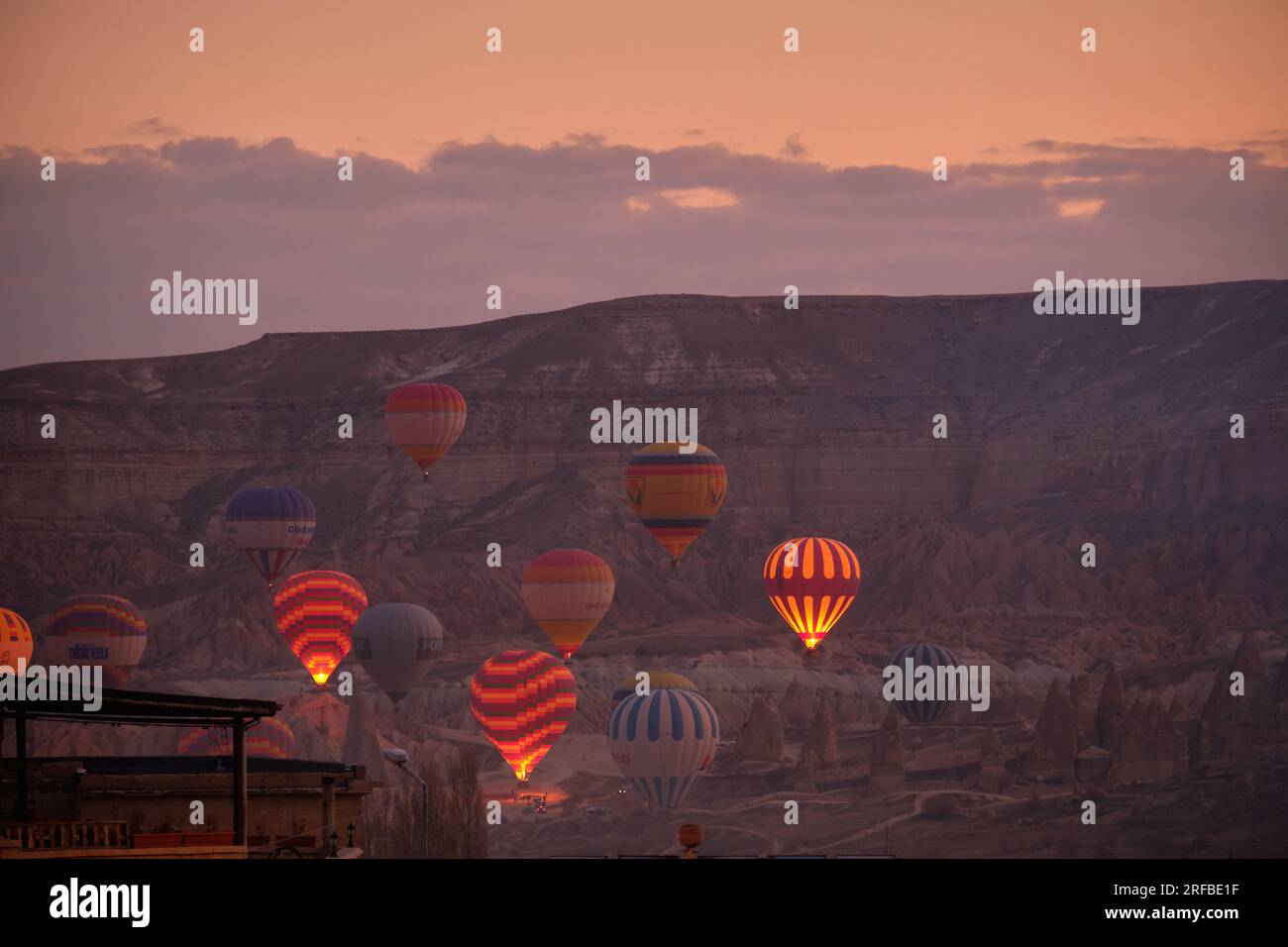 Balloons Flying in Cappadocia Stock Photo