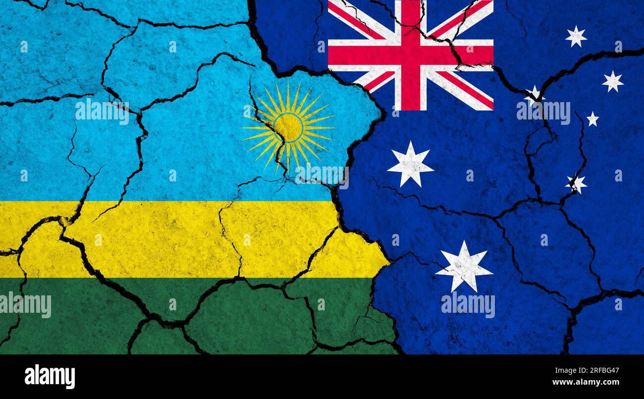 Flags of Rwanda and Australia on cracked surface - politics ...