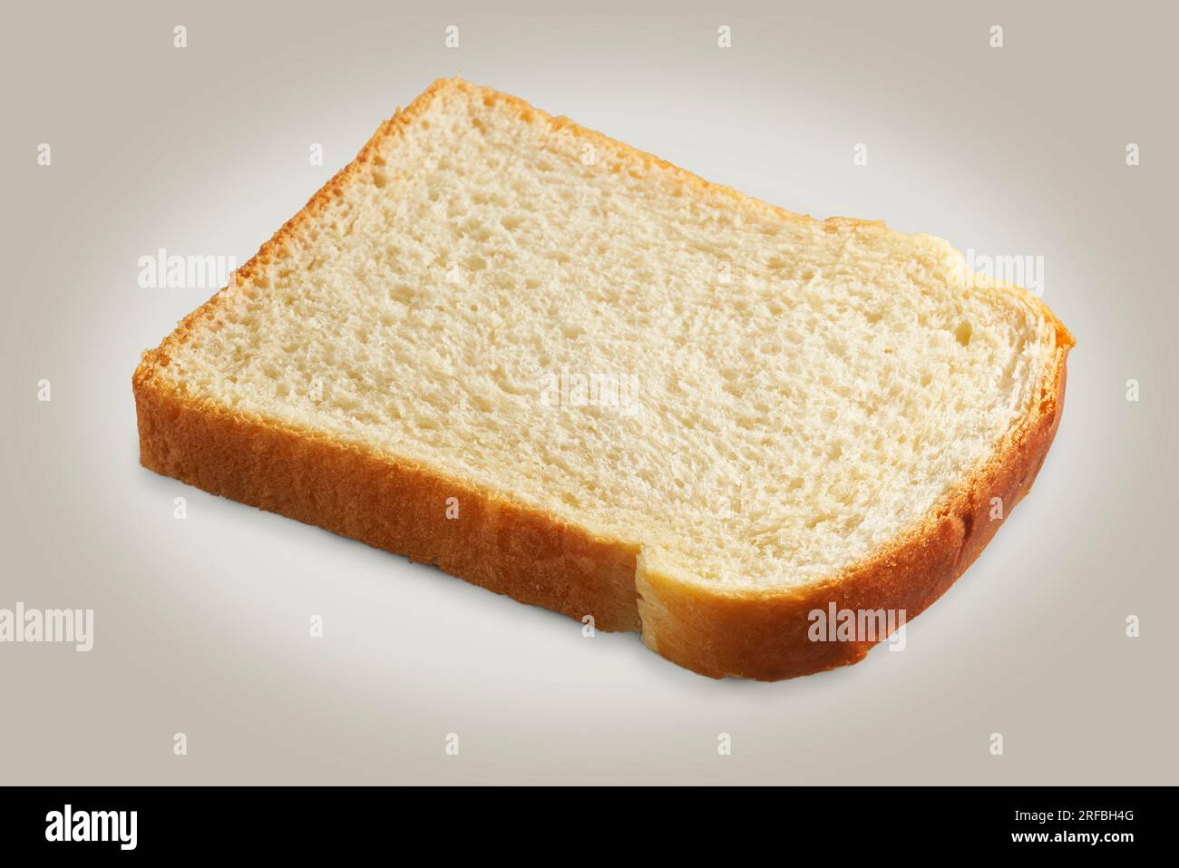 A slice of bread on a gray background Stock Photo