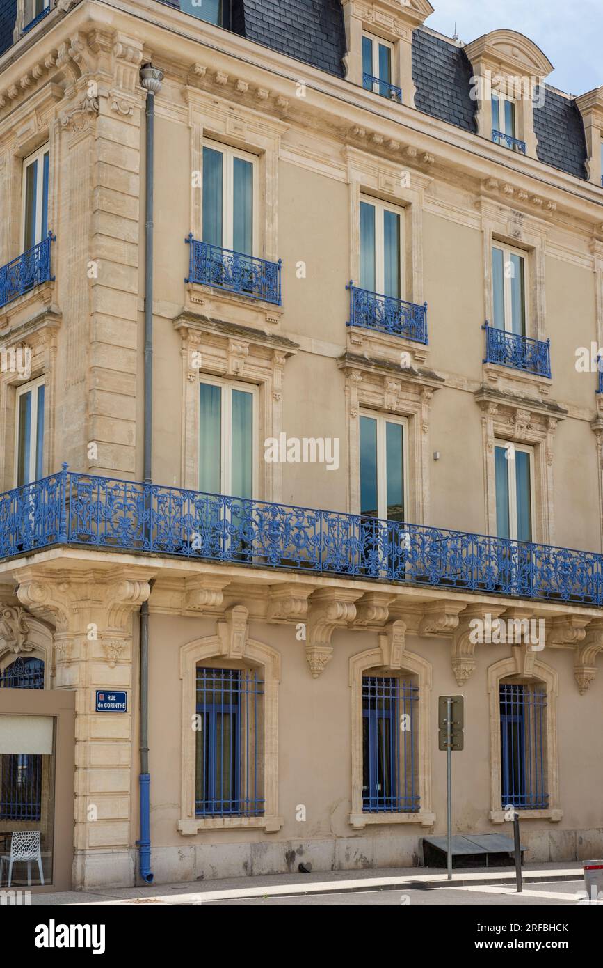Beautiful old building with blue iron railing, Marseillan, Herault, Occitanie, France Stock Photo
