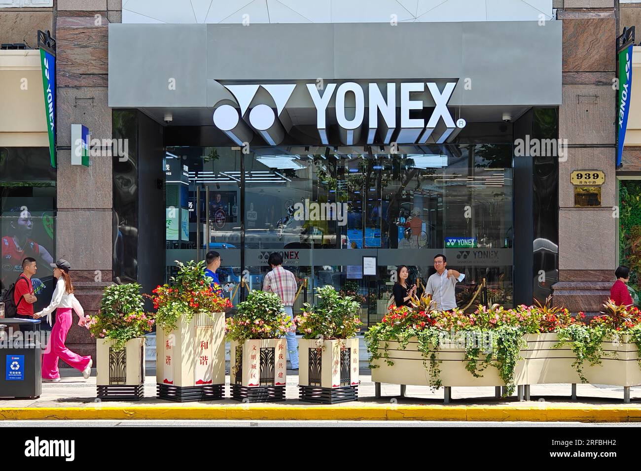 SHANGHAI, CHINA AUGUST 2, 2023 Citizens walk past the soontobe