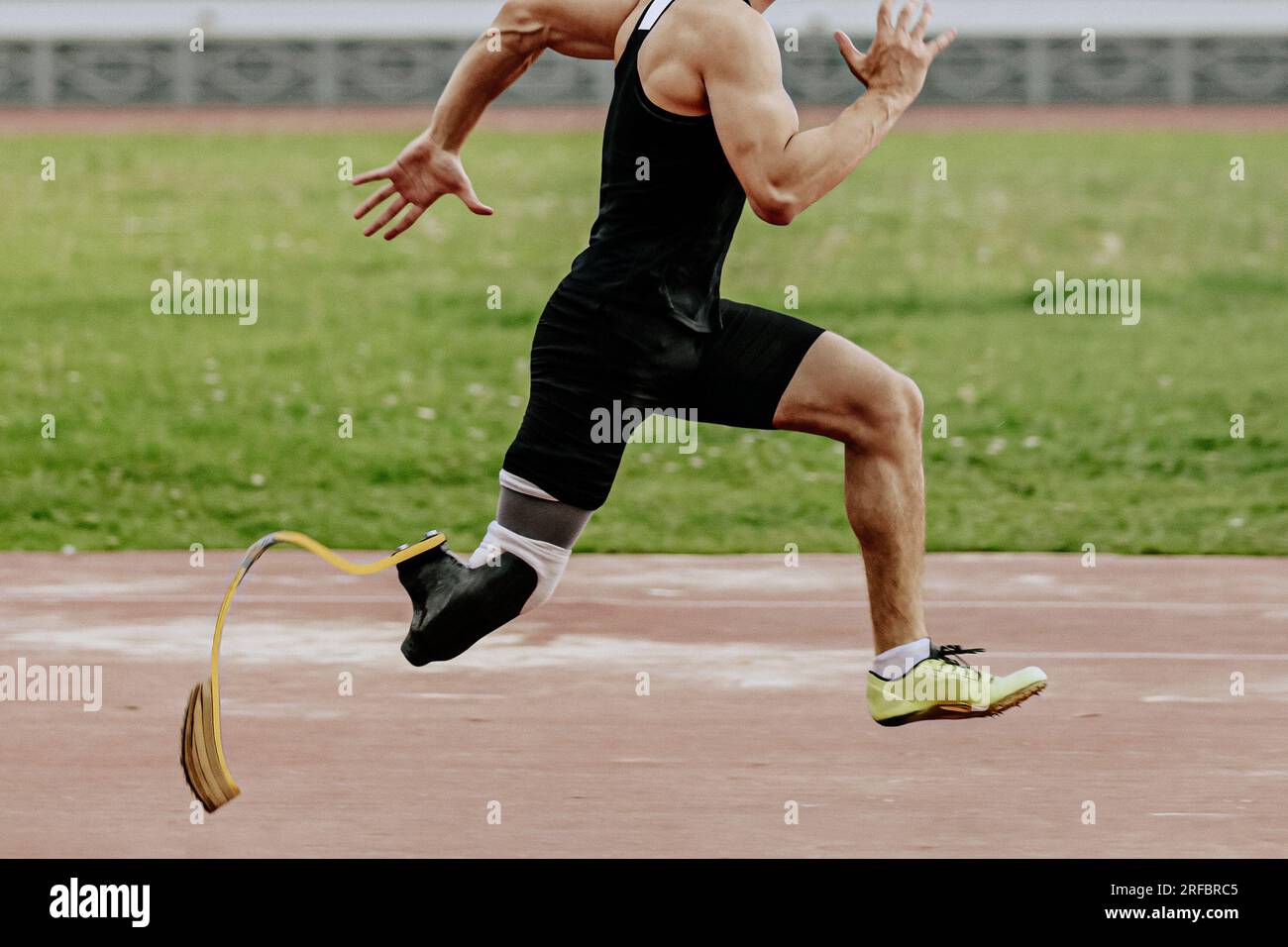 close-up athlete disability running sprint race in athletics competition, sports summer games Stock Photo