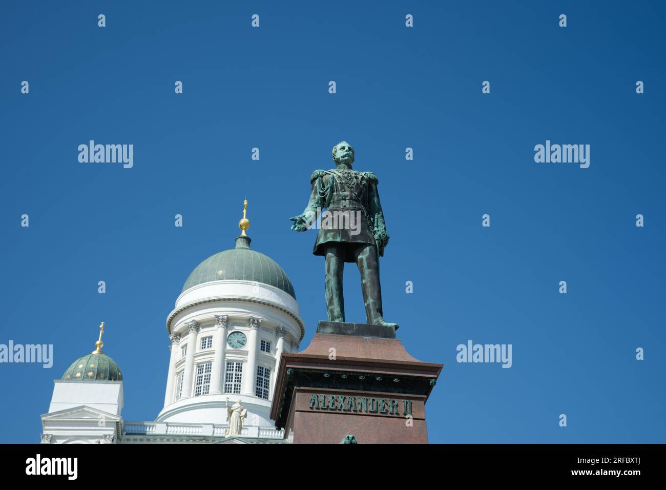 Statue of Grand Duke of Finland Alexander II in front of the cathedral in Senate Square Helsinki, Finland Stock Photo