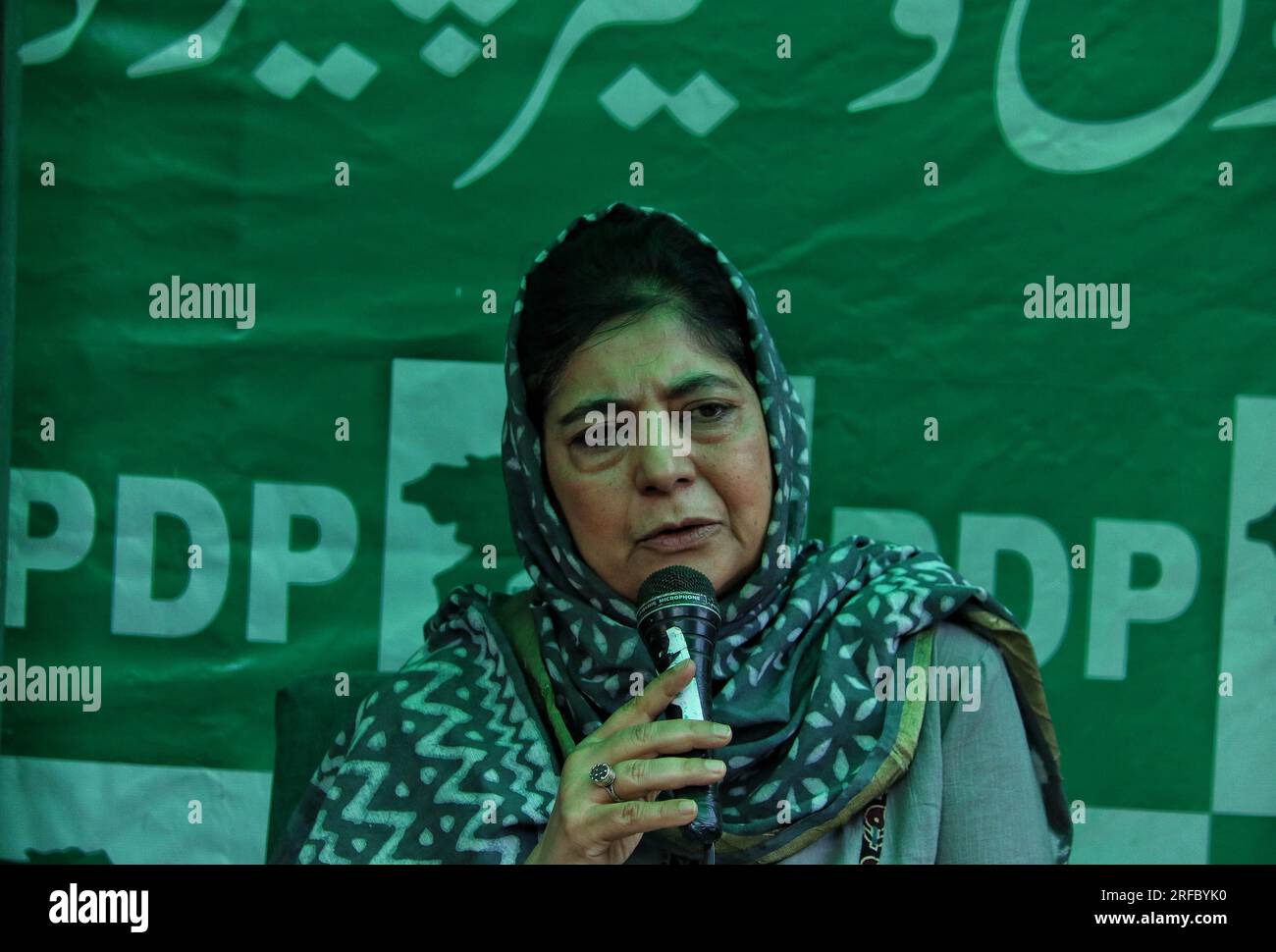 August 02, 2023, Srinagar Kashmir, India : Former Jammu and Kashmir Chief Minister Mehbooba Mufti, leader of The Jammu and Kashmir Peoples Democratic Party (PDP), addresses a press conference over the Supreme Court hearing on Article 370 abrogation, in Srinagar. The Supreme Court of India is hearing from 02 August a batch of petitions challenging the abrogation of Article 370 of the Indian Constitution that bestowed a special semi-autonomous status to the former state of Jammu and Kashmir. Prime Minister Narendra Modi-led government in India repealed Article 370 on 05 August 2019, ending the r Stock Photo