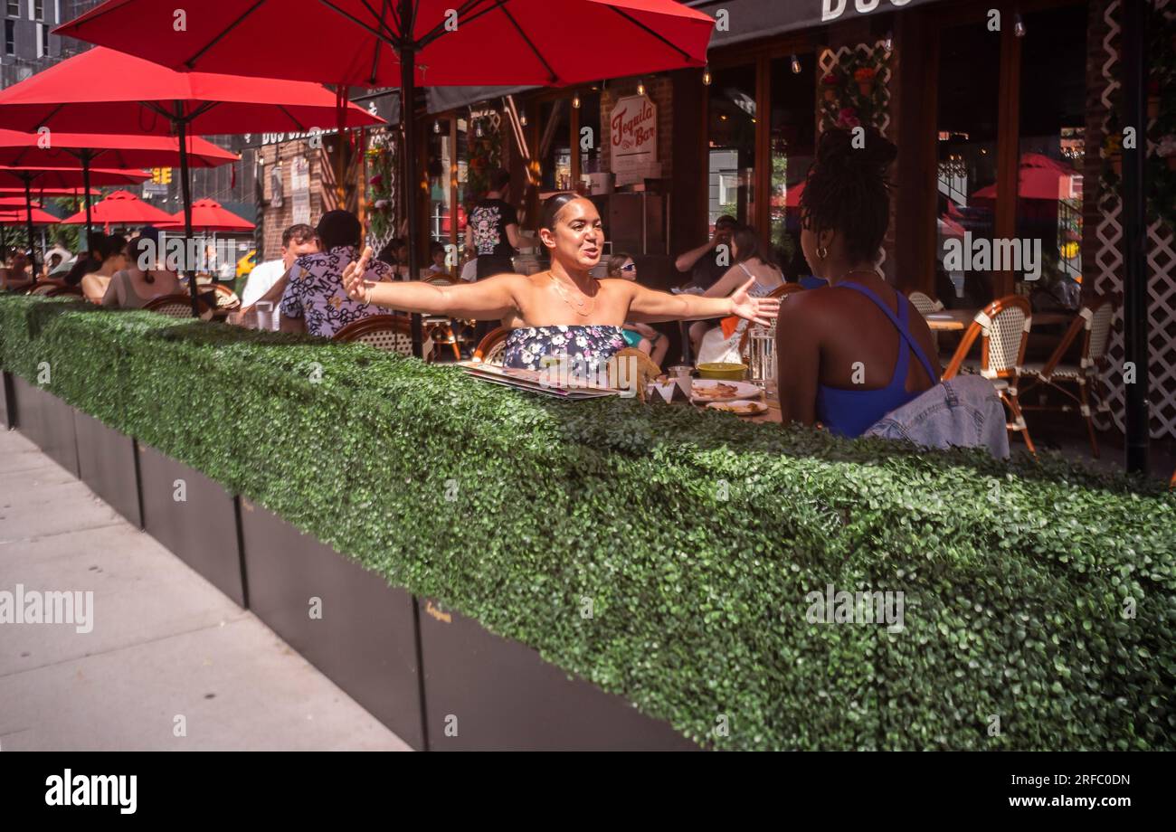 the-hot-weather-doesn-t-deter-people-from-coming-out-in-chelsea-in-new