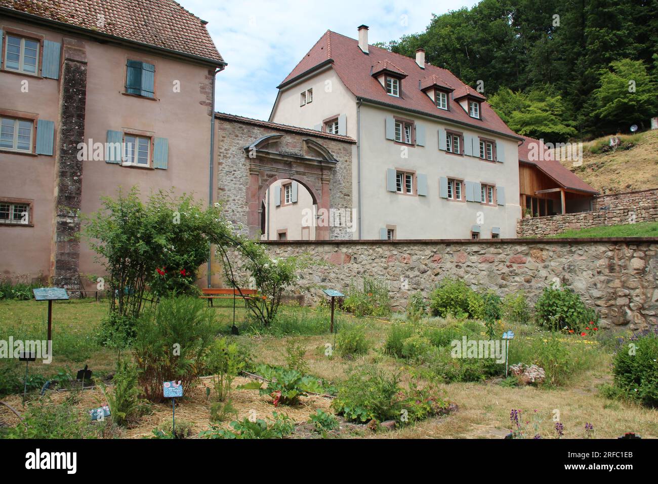 town hall, gardens of the abbey and house in murbach in alsace (france) Stock Photo