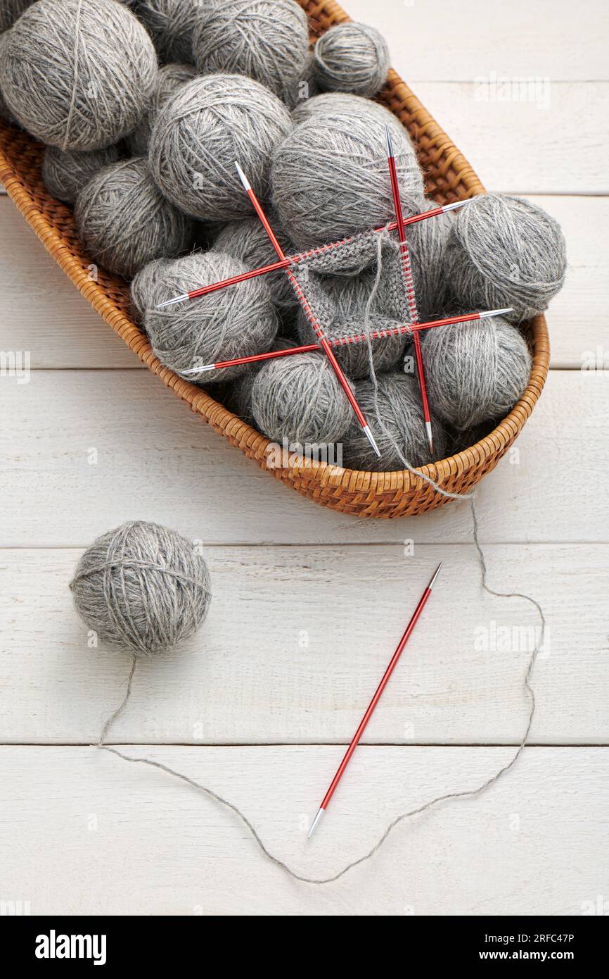 The process of knitting in the circle on doublesided knitting needles