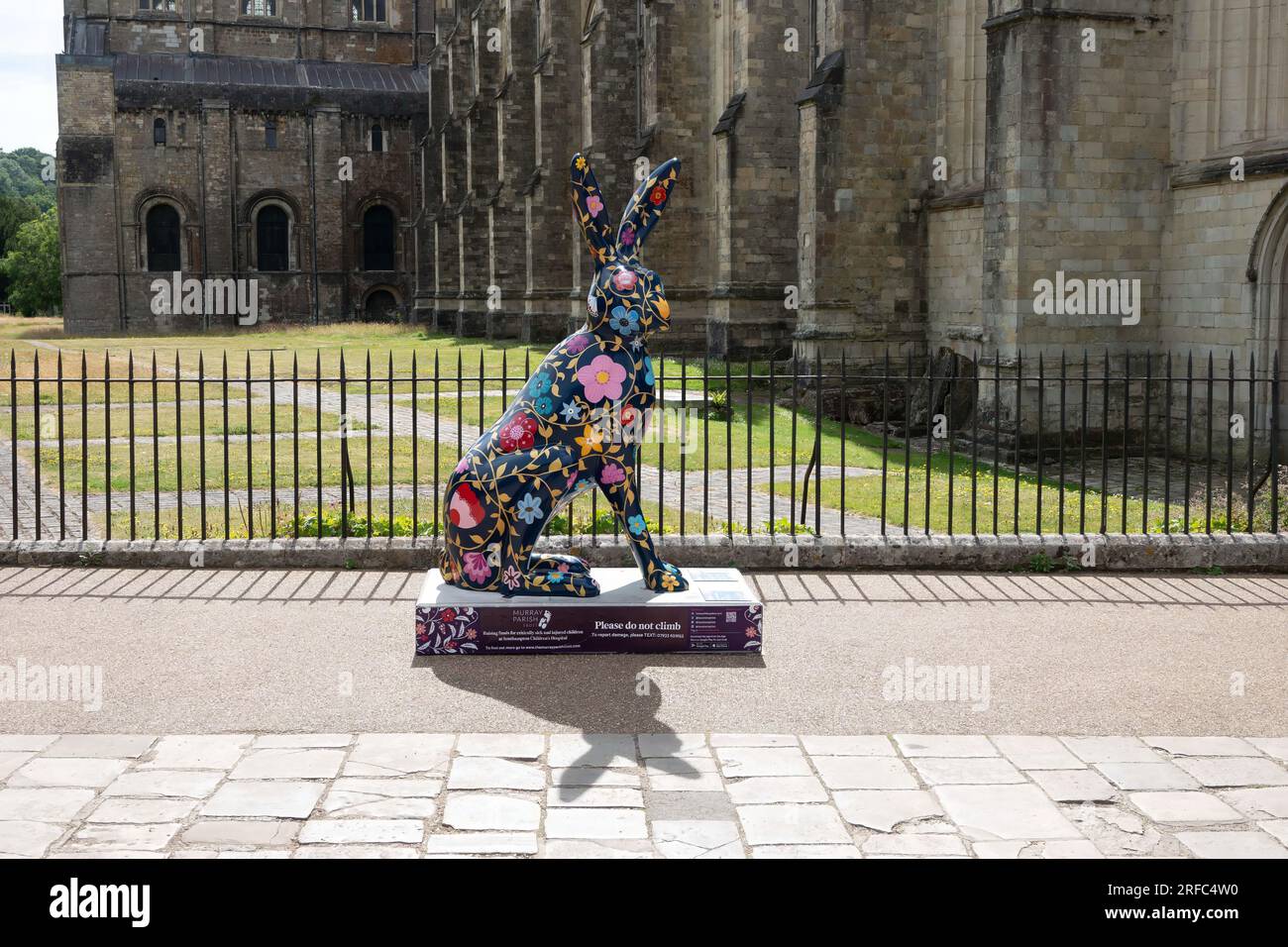 Hares of Hampshire Art trail Winchester England 2022, Flora and The Midnight Garden Hare by Marnie Maurri outside Winchester Cathedral Stock Photo